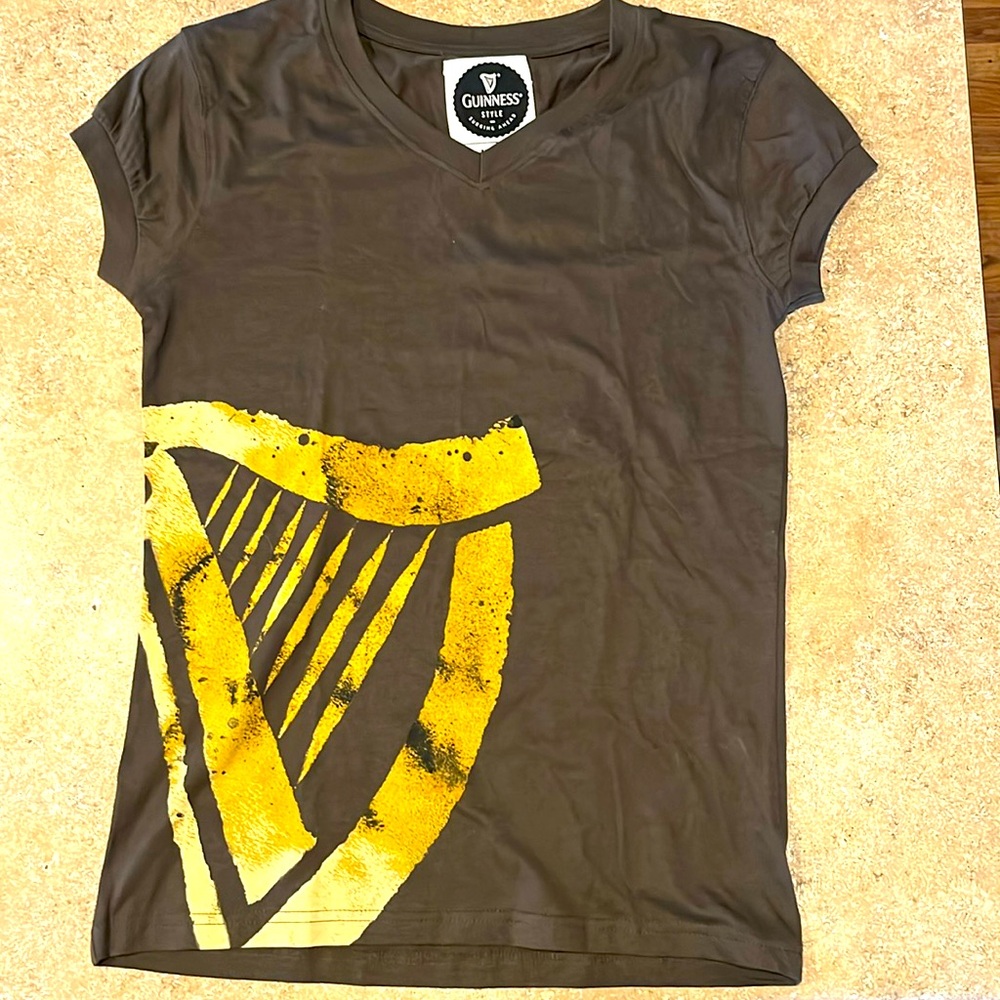 Authentic Guinness wear. Brand new. Great artwork of their infamous harp.